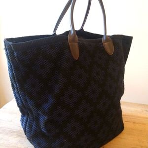 High end woven beach tote with leather handles